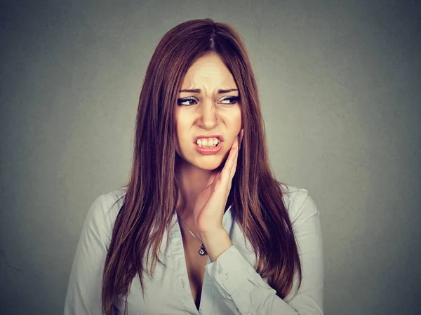 Woman with sensitive toothache about to cry from pain — Stock Photo, Image