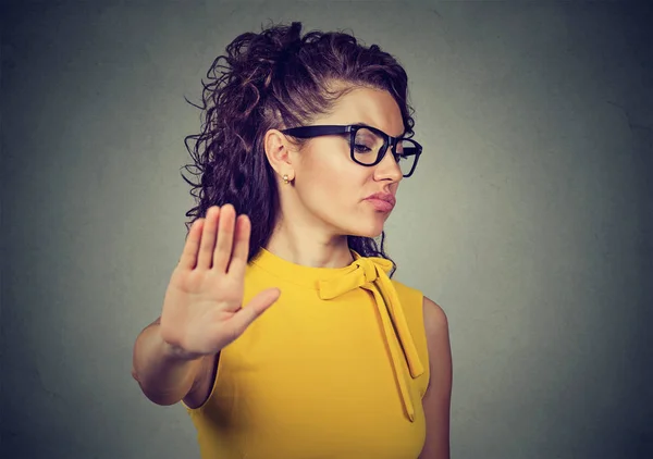 Angry woman with bad attitude giving talk to hand gesture — Stock Photo, Image
