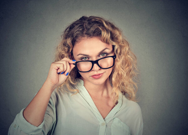 confused skeptical woman looking at you with disapproval