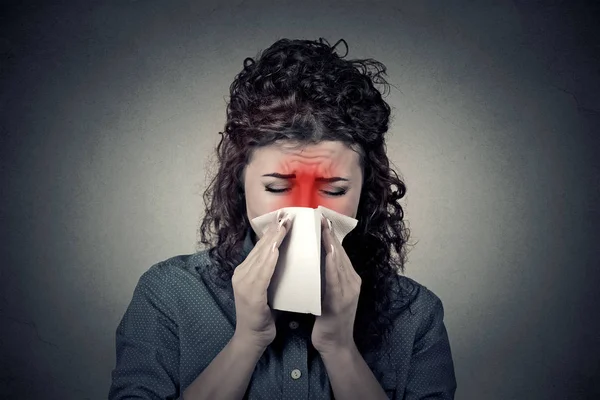 Closeup portrait woman sneezing in a tissue blowing her runny no — Stock Photo, Image