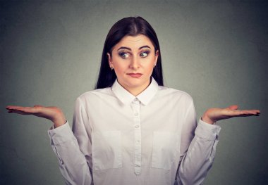 young woman with arms out shrugs shoulders has no answer   clipart