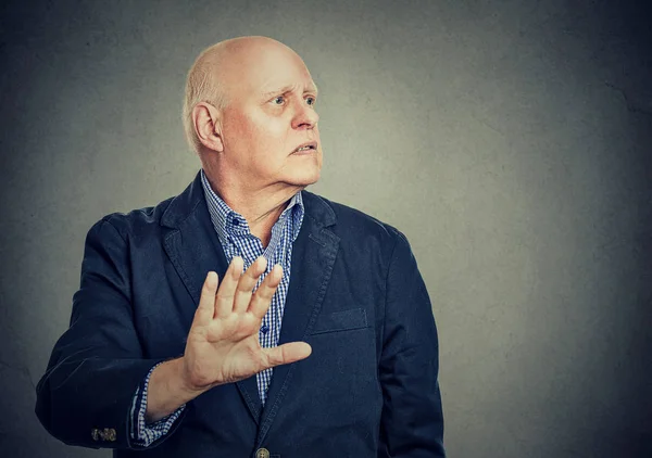 Upset annoyed man giving talk to my hand gesture — Stock Photo, Image