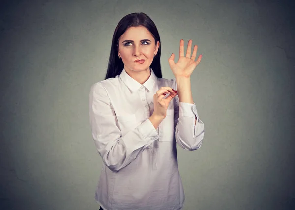 Confused woman pinching herself in disbelief of what just happened — Stock Photo, Image