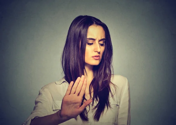 Upset angry woman giving talk to hand gesture with palm outward — Stock Photo, Image