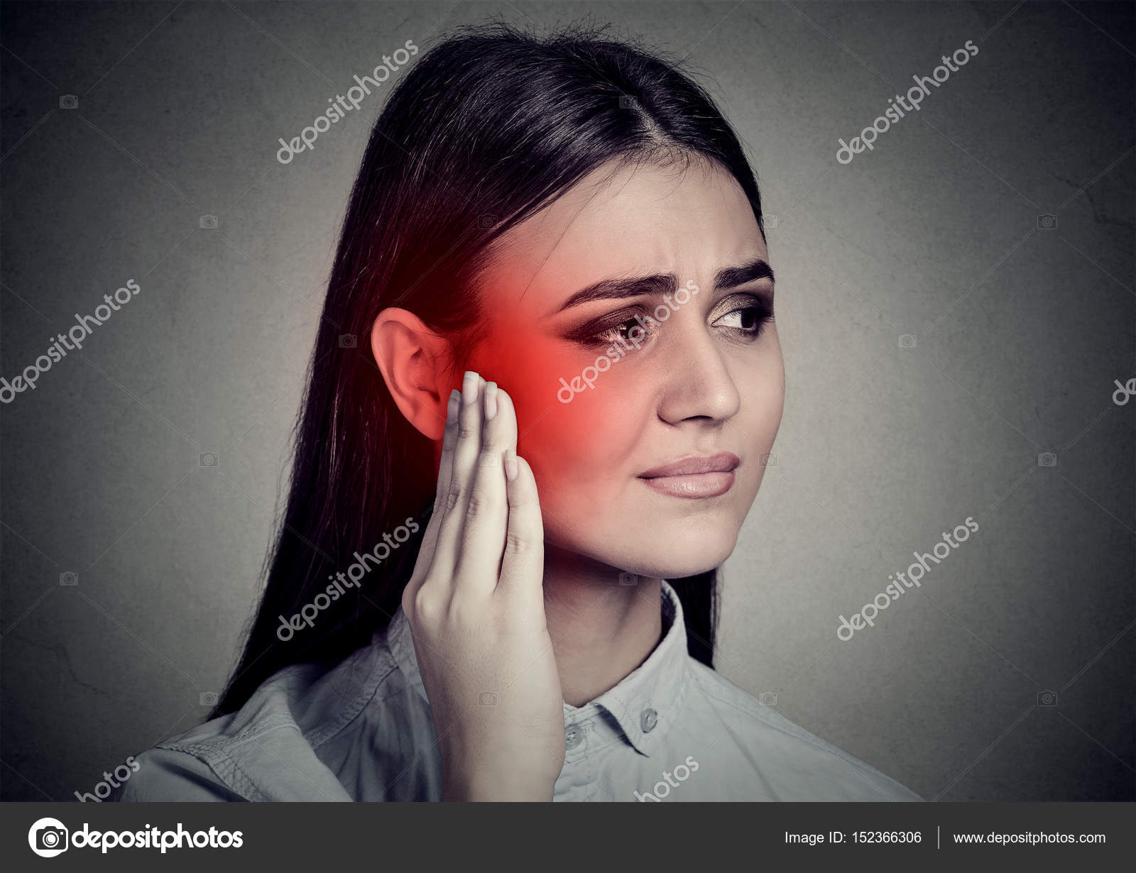 Tinnitus. Sick woman having ear pain touching her temple — Stock Photo © SIphotography 152366306