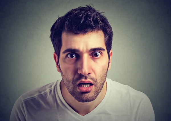 Portrait of surprised stunned young man — Stock Photo, Image