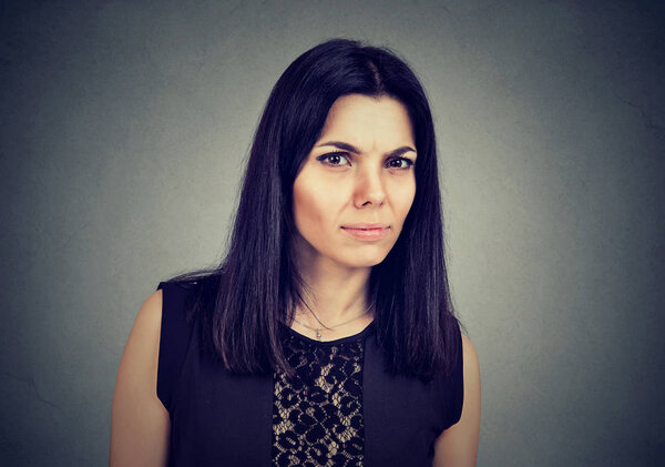 Portrait of a serious suspicious middle aged woman 