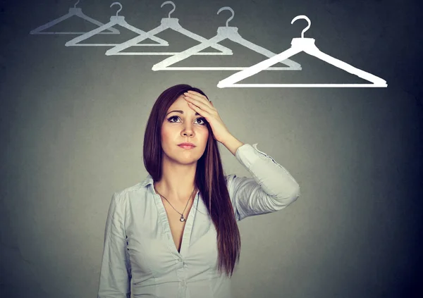 I have nothing to wear! Perplexed woman thinking what to dress — Stock Photo, Image