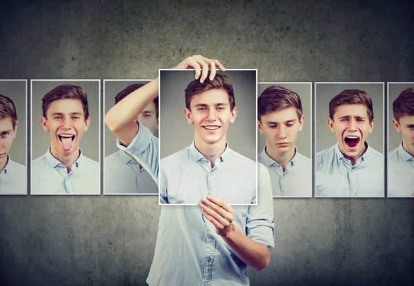 Mascarado homem adolescente expressando diferentes emoções rosto expressões — Fotografia de Stock