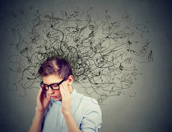 Thoughtful stressed young man with a mess in his head — Stock Photo, Image