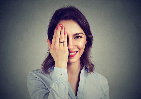 Cute shy woman looking at camera 