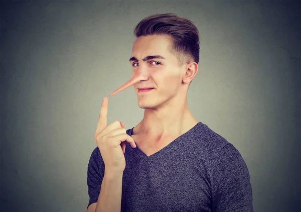 Man with long nose. Liar concept. Human emotions, feelings. — Stock Photo, Image