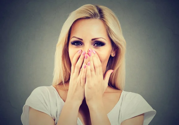 Portrait of a happy woman being shy laughing and covering face with hands — Stock Photo, Image