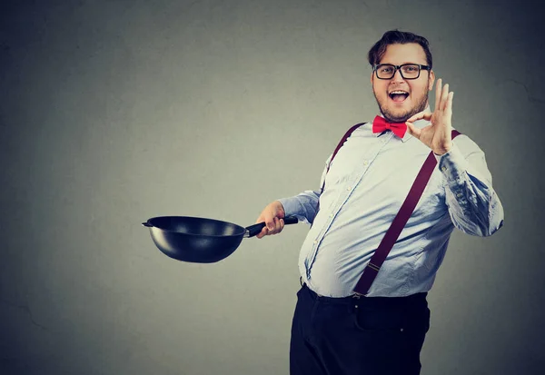 Professional chef posing on gray — Stock Photo, Image