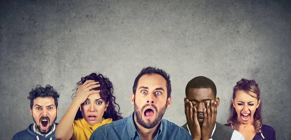 Kvinnor och män att uttrycka ilska, desperation, chock — Stockfoto