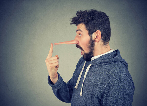 Man with long nose. Liar concept. 