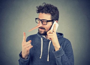 sly liar man with long nose talking on mobile phone clipart