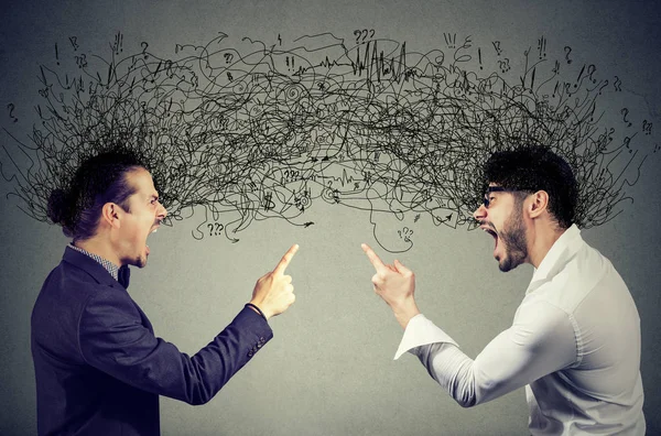 Angry men screaming at each other exchanging with negative thoughts — Stock Photo, Image