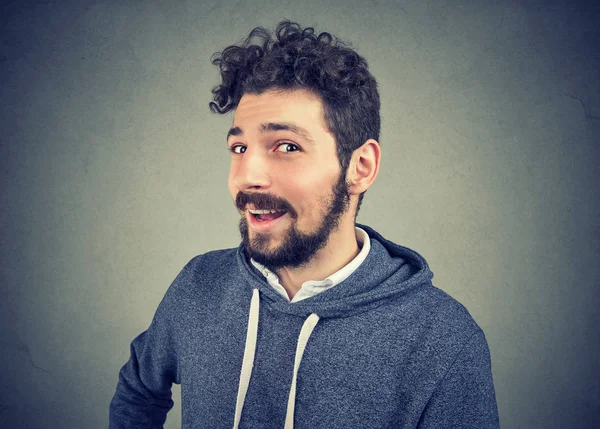 Cunning tricky young man looking at camera — Stock Photo, Image