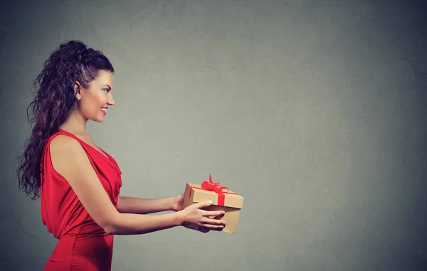 Woman giving a great present — Stock Photo, Image