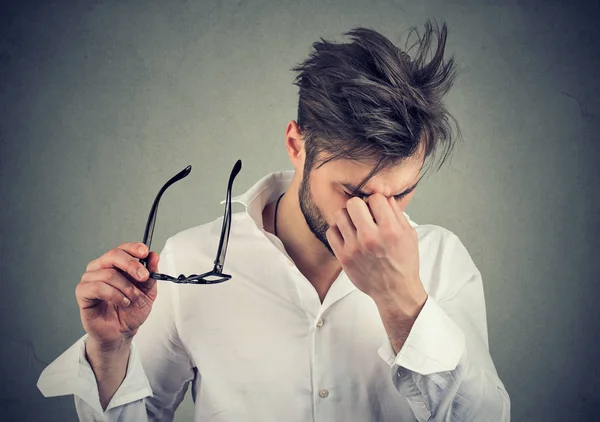 Man with glasses suffering from eyestrain — Stock Photo, Image