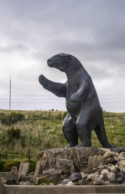 A mylodon statue, promoting the Cueva del Milodon tourist attraction in Puerto Natales, Torres del Paine, Chile clipart