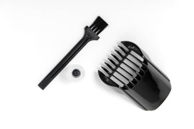 Trimmer, oil and brush on a white isolated background. Beard Care. clipart