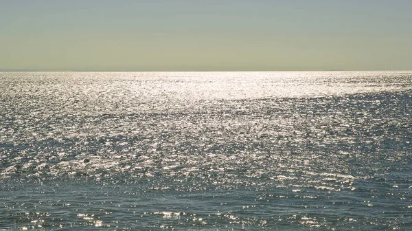 Sun twinkling and reflecting off the ocean