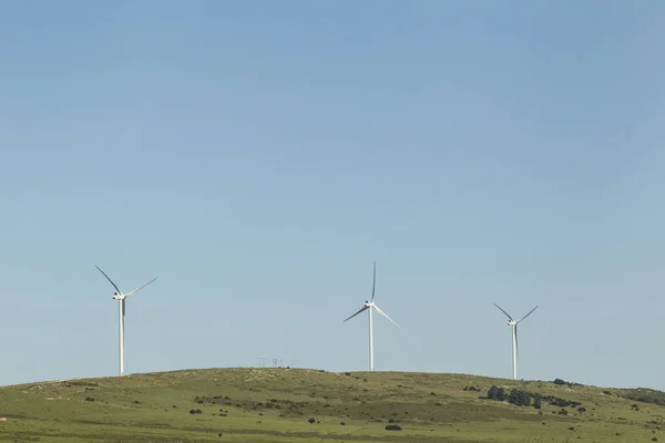 Three large wind turbines