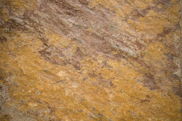 Narancssárga durva szerkezetű kő háttér — Stock Fotó