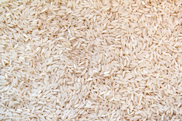 Pişmemiş beyaz pirincin en üst görüntüsü. Arkaplan