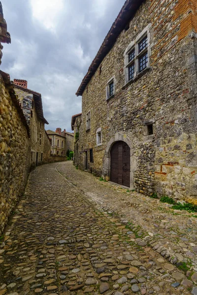 View of an alley in the medieval village Perouges, Ain department, France