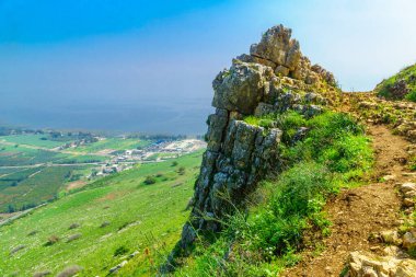 View of hiking trail, rocks and the Sea of Galilee, Mount Arbel, Northern Israel clipart