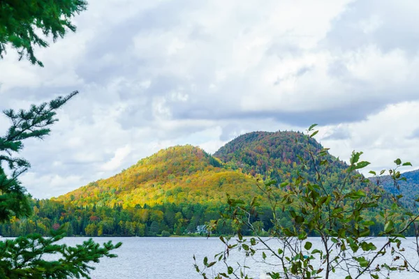 View of Superior Lake, and fall foliage colors in the Laurentian Mountains, Quebec, Canada