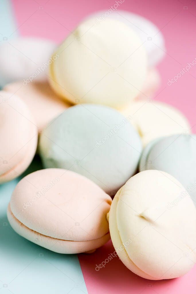 Colored sweet dessert zephyr marshmallows . Air colrful zephyr, pastel colors. Close up, food photography