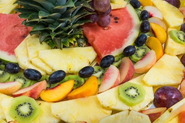 compositions of fresh fruit cut for buffets.
