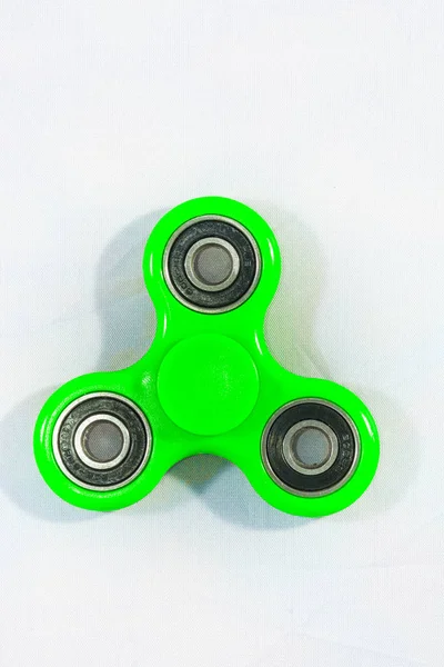 Fidget Spinner in white isolated background.