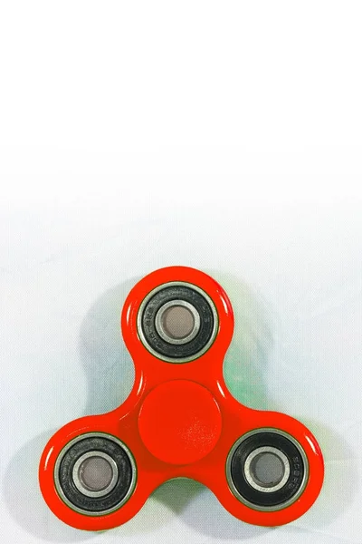 Fidget Spinner in white isolated background.