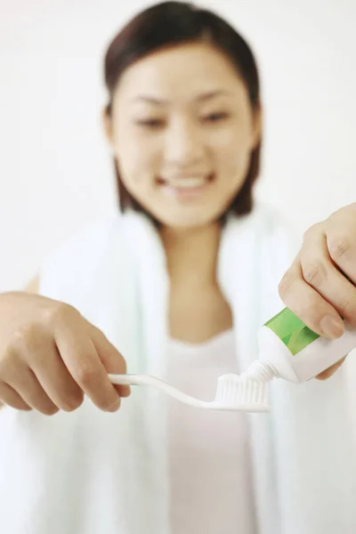 Woman Squeezing Toothpaste Toothbrush — Stock Photo, Image