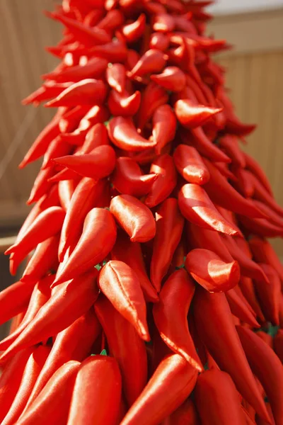 Strings of red chillies close-up view