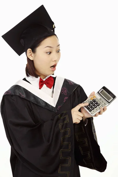 Mulher Roupão Formatura Segurando Uma Calculadora — Fotografia de Stock