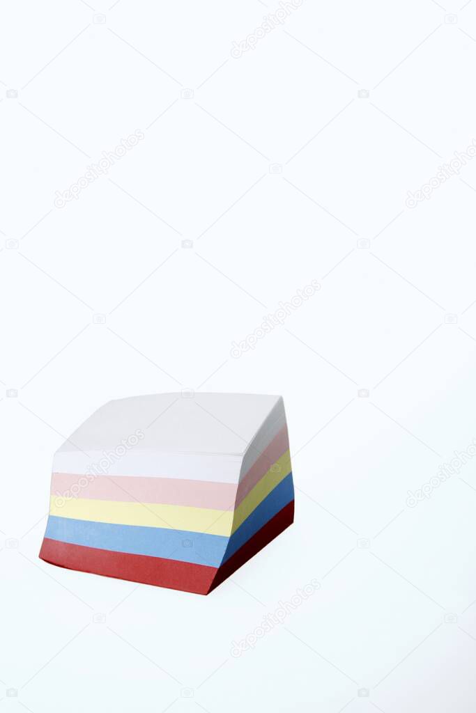 A stack of colourful notepad