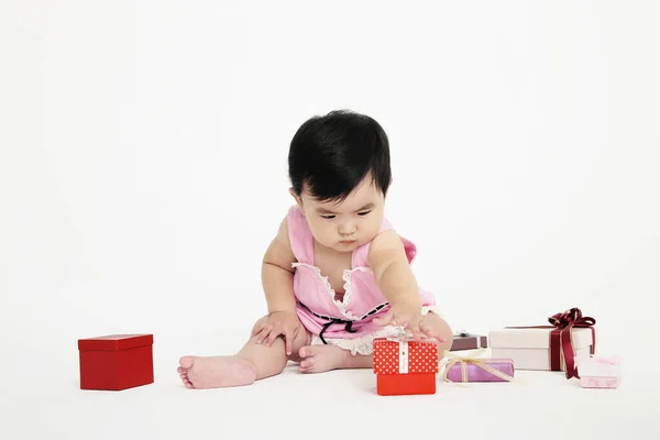 Baby Girl Reaching Out Take Gift Box — Stock Photo, Image