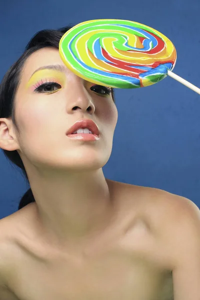 beautiful woman with lollipop
