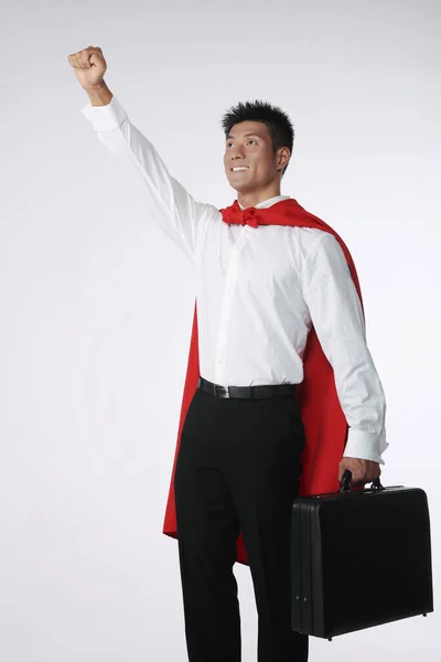 Empresário Com Capa Vermelha Levantando Mão — Fotografia de Stock