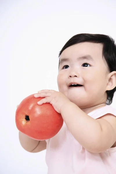 Baby Girl Holding Apple — Stock Photo, Image