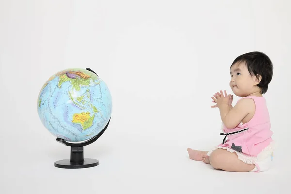 Baby Girl Sitting Globe — Stock Photo, Image