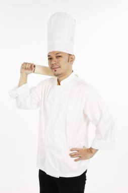 Asyalı şef elinde oklavayla