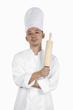 Asyalı şef elinde oklavayla