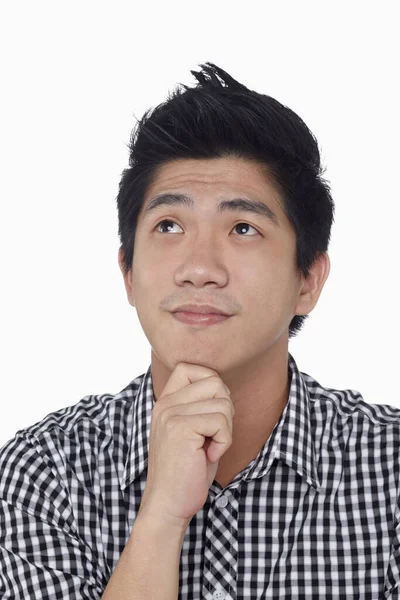 Beyaz arka planda izole edilmiş bir adamın yüz ifadesi